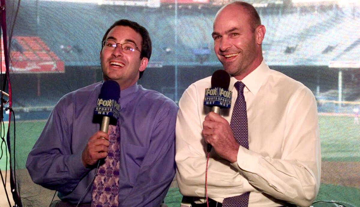 Broadcaster Josh Lewin and former Dodger Kirk Gibson work a Tigers game.