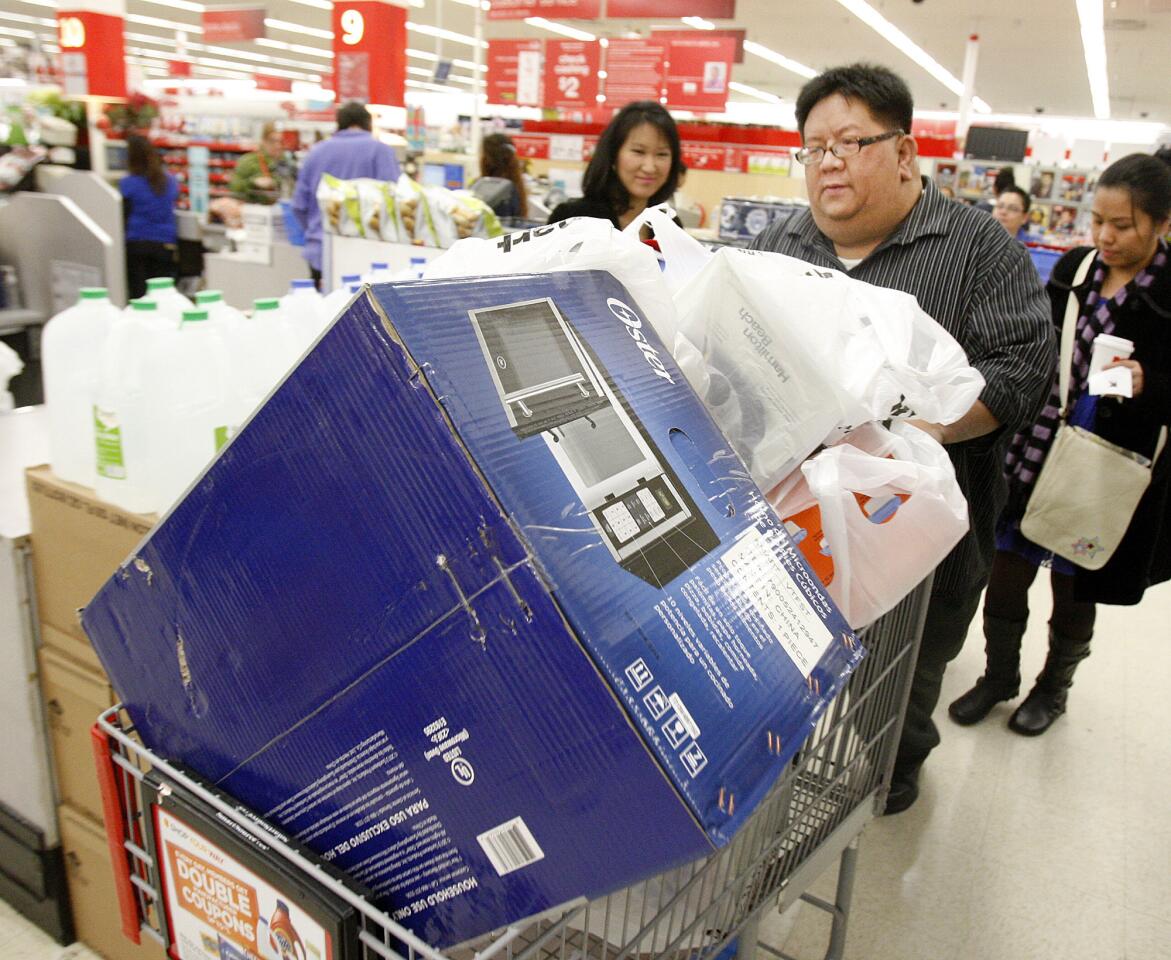 Photo Gallery: Thanksgiving Day Kmart shoppers