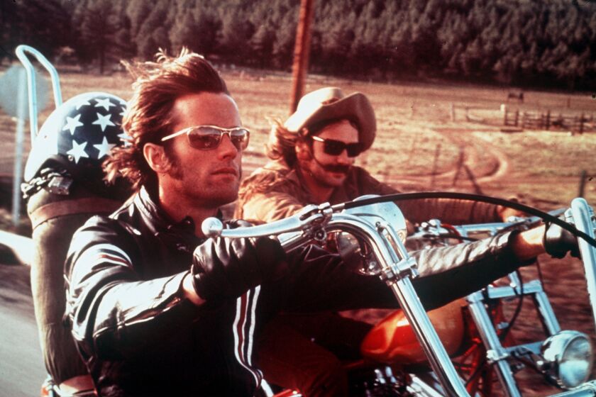 Perhaps the ultimate road movie, 1969's smash hit "Easy Rider," with Peter Fonda, left, and Dennis Hopper, ushered in an era of youth-oriented studio films.