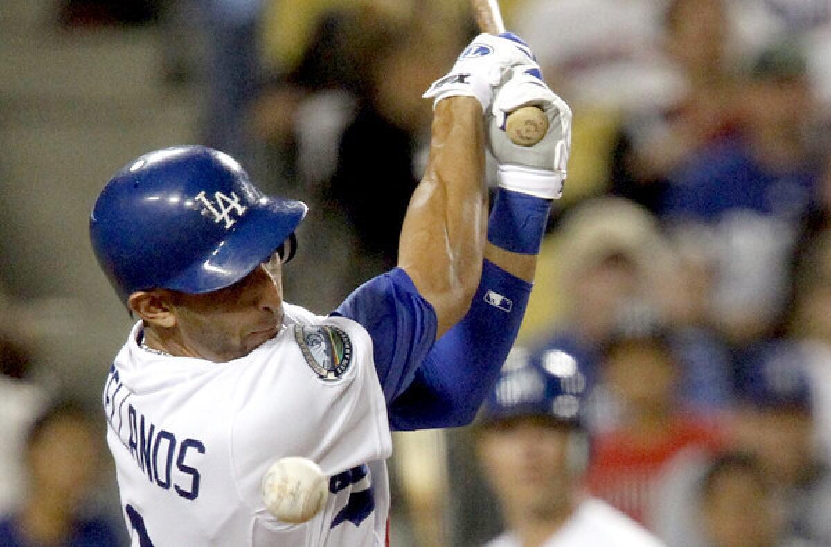 Dodgers outfielder Alex Castellanos fouls off a pitch during a game against the Marlins. The Dodgers dealt him to the Red Sox for minor league outfielder Jeremy Hazelbaker.