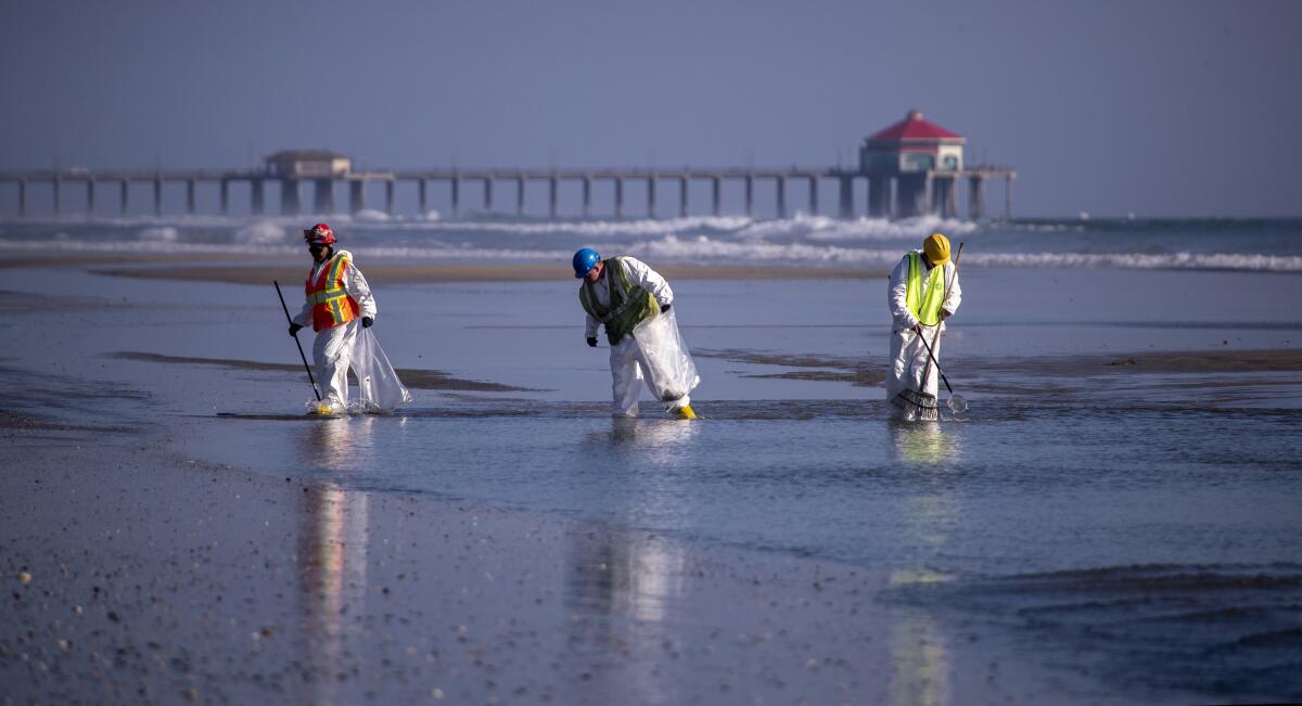 Cleanup from a major oil spill continues in Huntington Beach