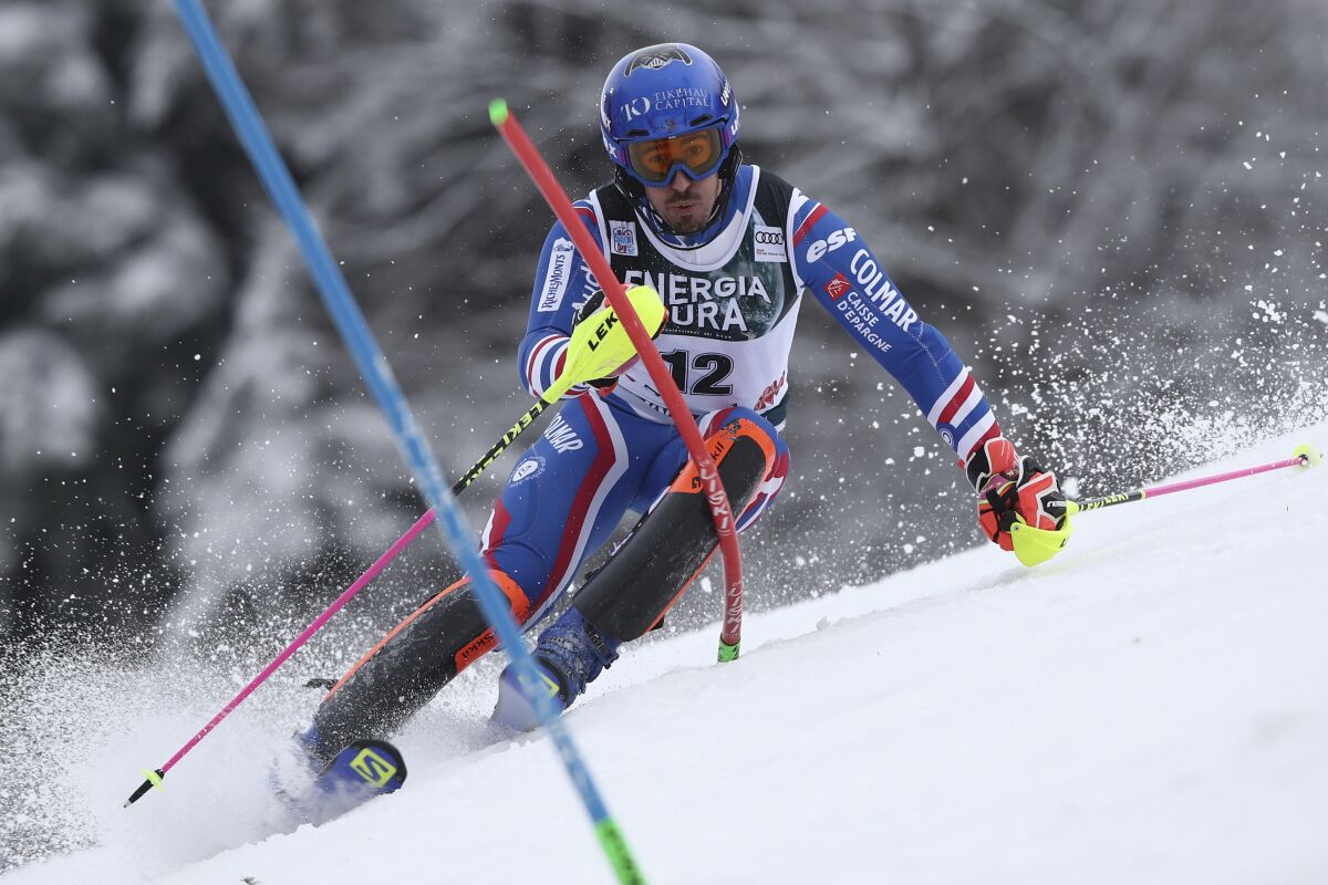 France's Victor Muffat Jeandet speeds down the course during an alpine ski, men's World Cup slalom in Zagreb, Croatia, Thursday, Jan. 6, 2022. (AP Photo/Gabriele Facciotti)