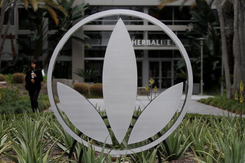 Los Angeles nutritional products company Herbalife Ltd. reported first-quarter earnings Tuesday. Above, an office building in Torrance at which many of its corporate employees work.