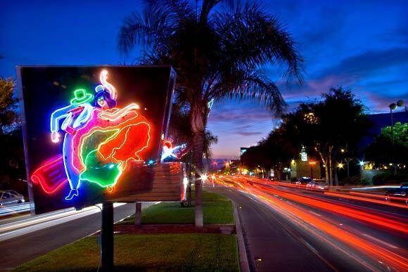 Neon artwork stands along Santa Monica Boulevard presented by West Hollywood in collaboration with the Museum of Neon Art. The work is a part of four neon displays called "On Route  66 Lights." Along this street, you'll find nightclubs and restaurants with names such as FUBAR and Mother Lode