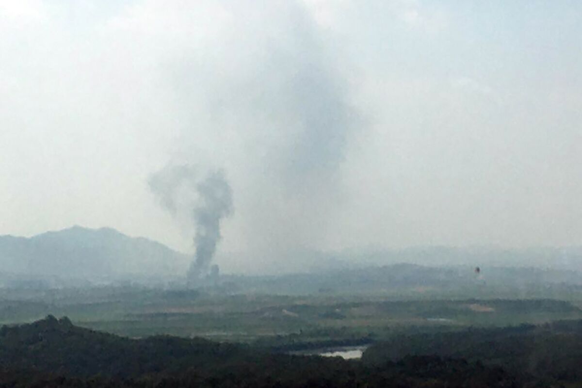 Smoke rises in the North Korean border town of Kaesong, where an inter-Korean liaison office was blown up.