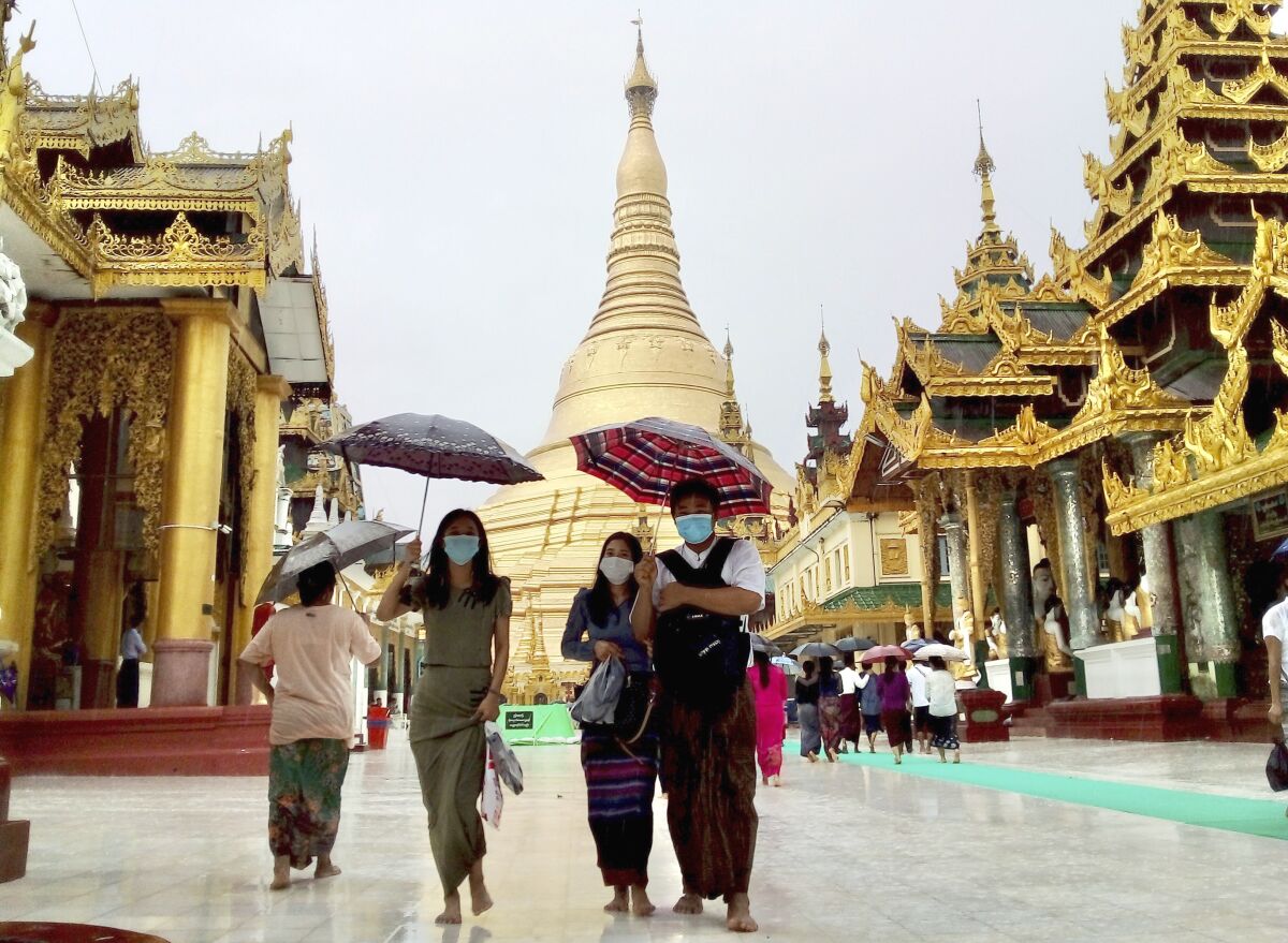 Pilgrims visit Myanmar famous Shwedagon Pagoda in Yangon, Myanmar on Sunday, June 19, 2022. Several visitors said they came to the famous temple to say prayers for Aung San Suu Kyi, the country's ousted leader, on her 77th birthday, which she spent in military detention. (AP Photo)