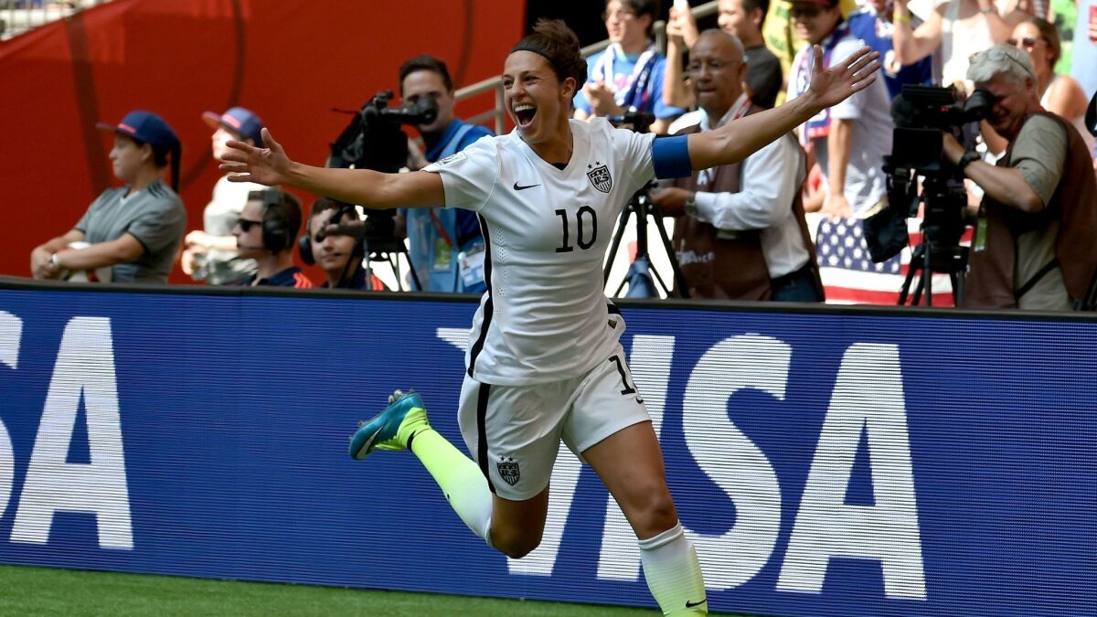 Carli Lloyd celebrates her second goal in the first half against Japan in the 2015 FIFA Women's World Cup final.