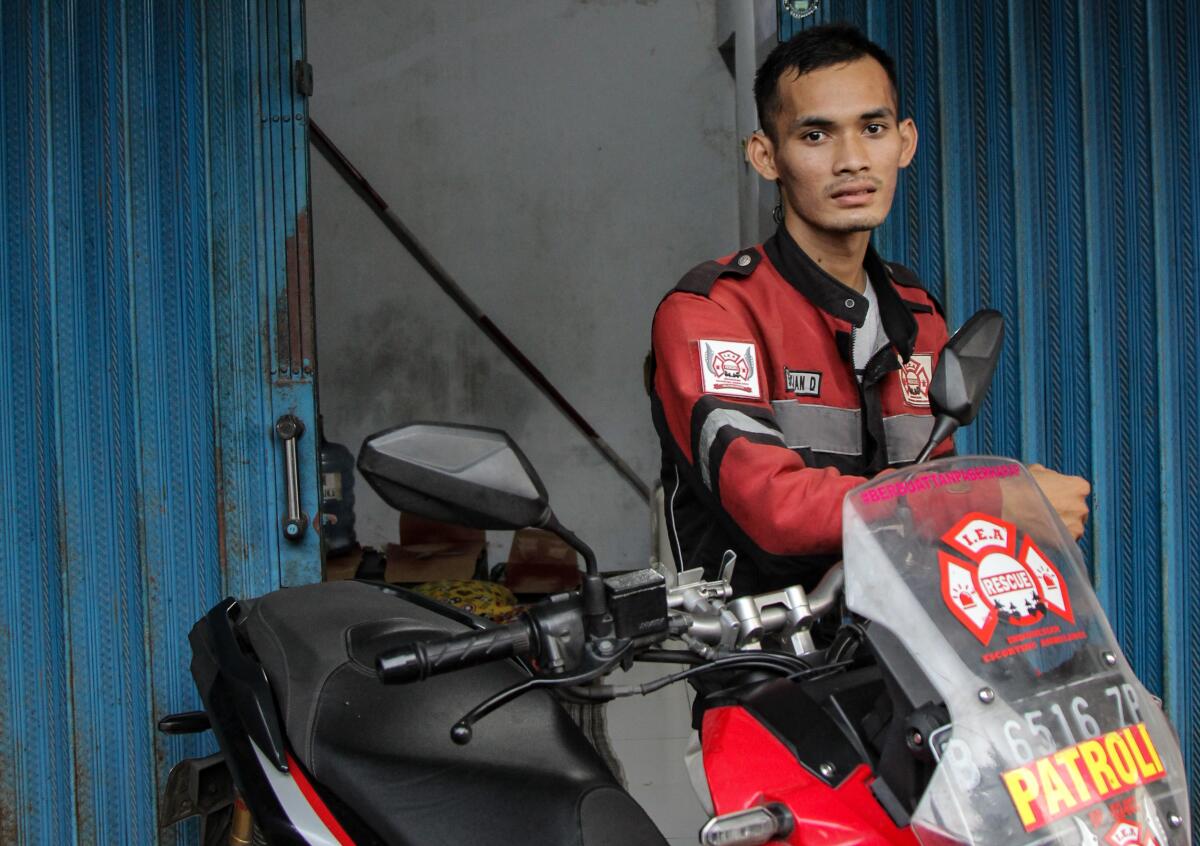 Sebastian Dwiantoro poses on his motorcyle.