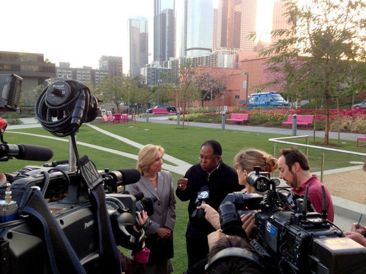 Mayoral candidate Wendy Greuel and Los Angeles County Supervisor Mark Ridley-Thomas talk to the press Sunday night.