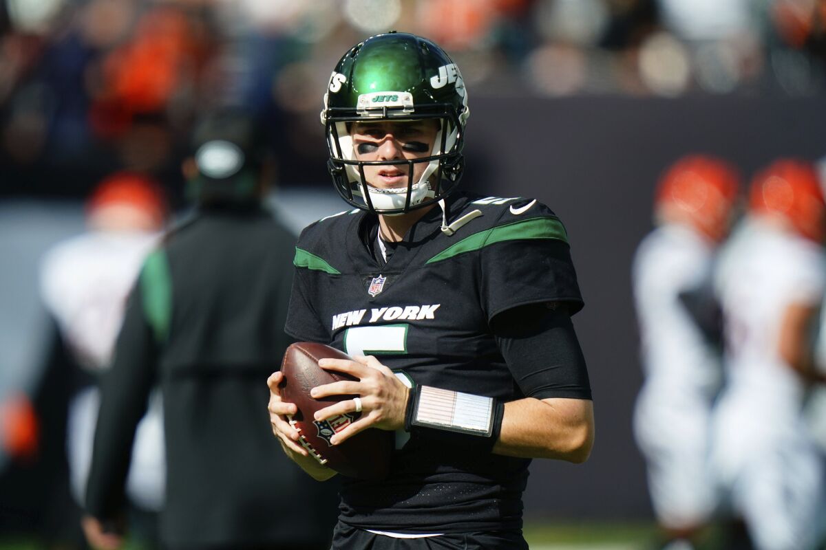 New York Jets quarterback Mike White warms-up before an NFL football game against the Cincinnati Bengals, Sunday, Oct. 31, 2021, in East Rutherford, N.J. (AP Photo/Frank Franklin II)