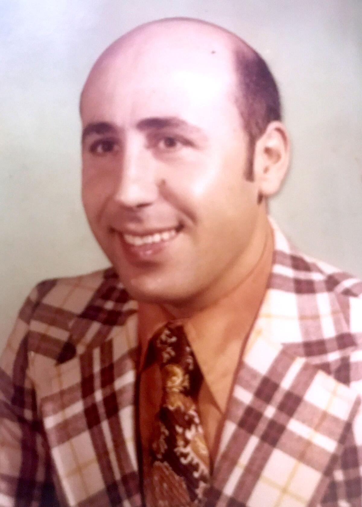 An undated photo of Alex Odeh in a plaid jacket 