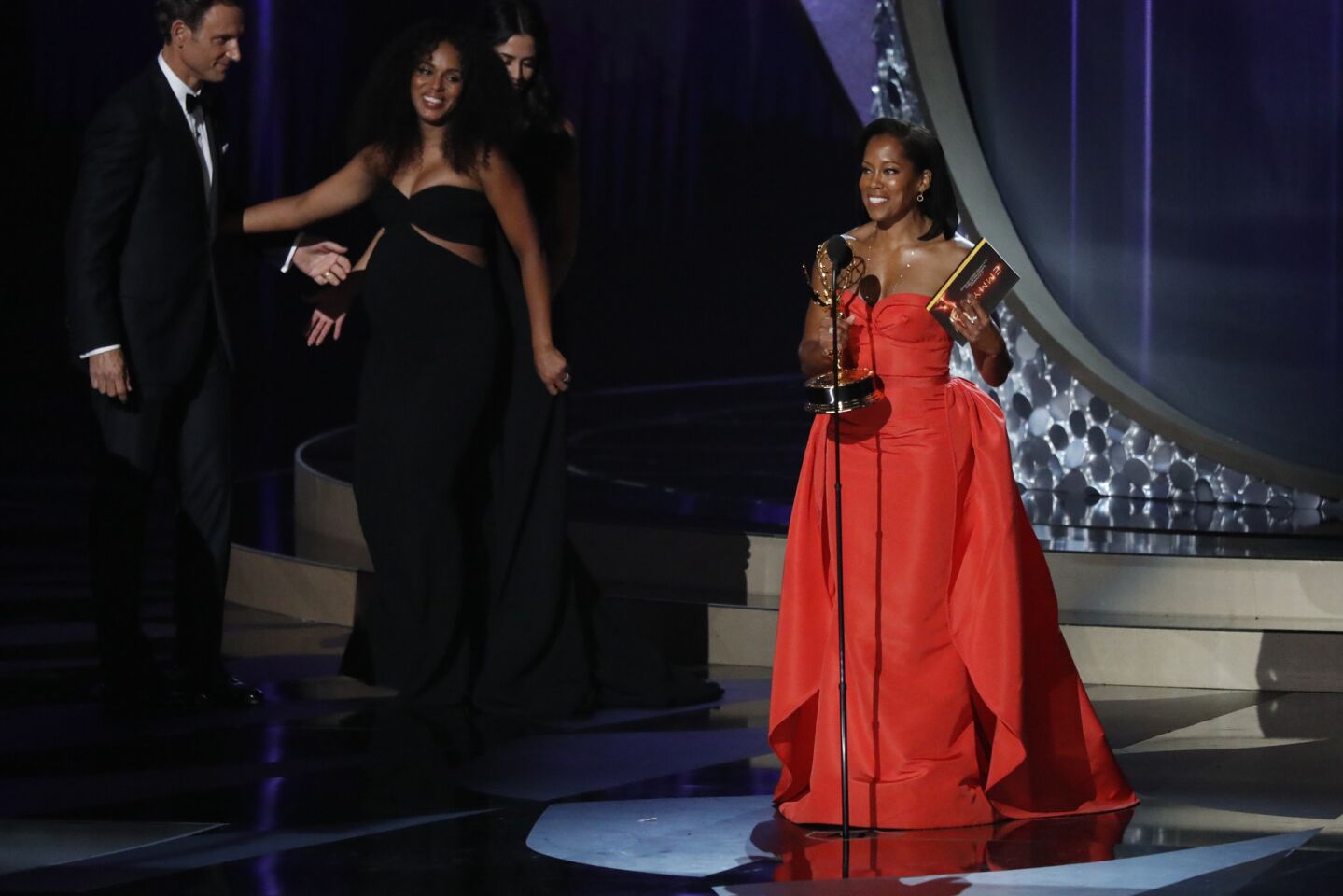 "American Crime" actress Regina King celebrates her win for supporting actress in a limited series or movie.