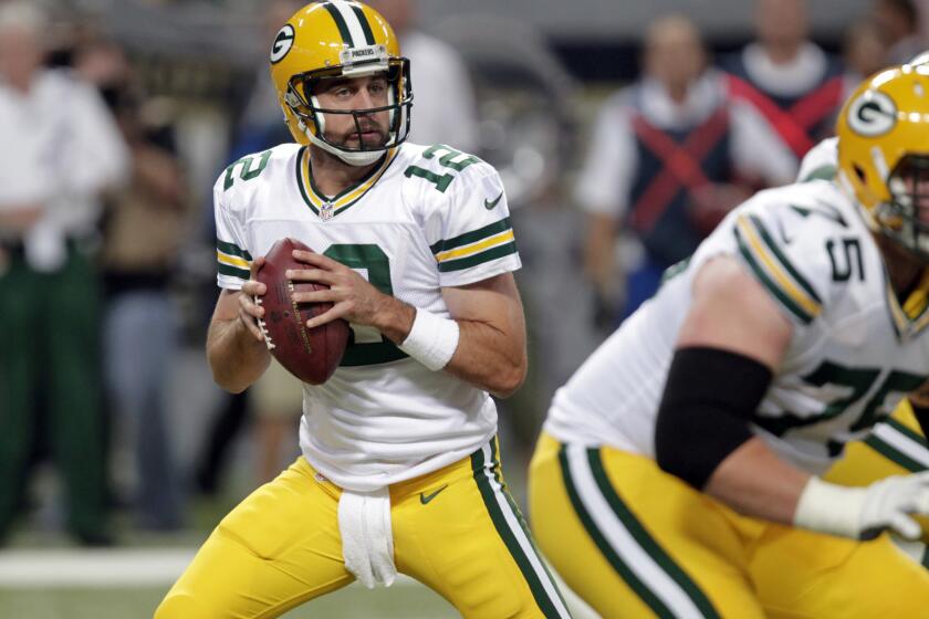 Green Bay quarterback Aaron Rodgers completed 11 of 13 for 128 yards and a touchdown Saturday against St. Louis.