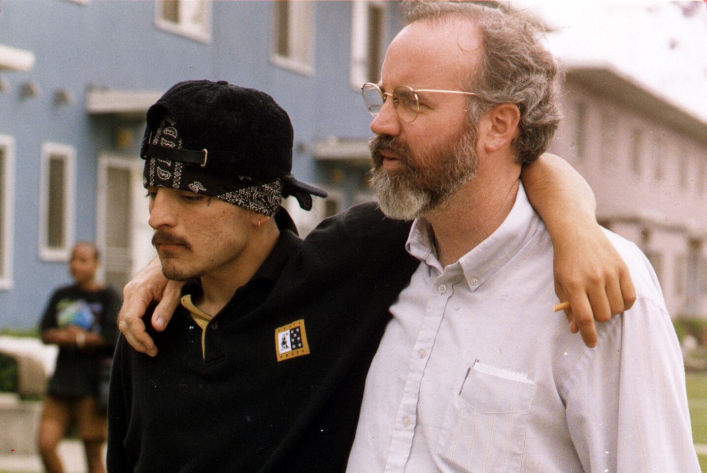 Boyle used to negotiate truces and peace treaties among warring gangs but stopped doing that years ago. Above, he meets with a gang member in March 1997.