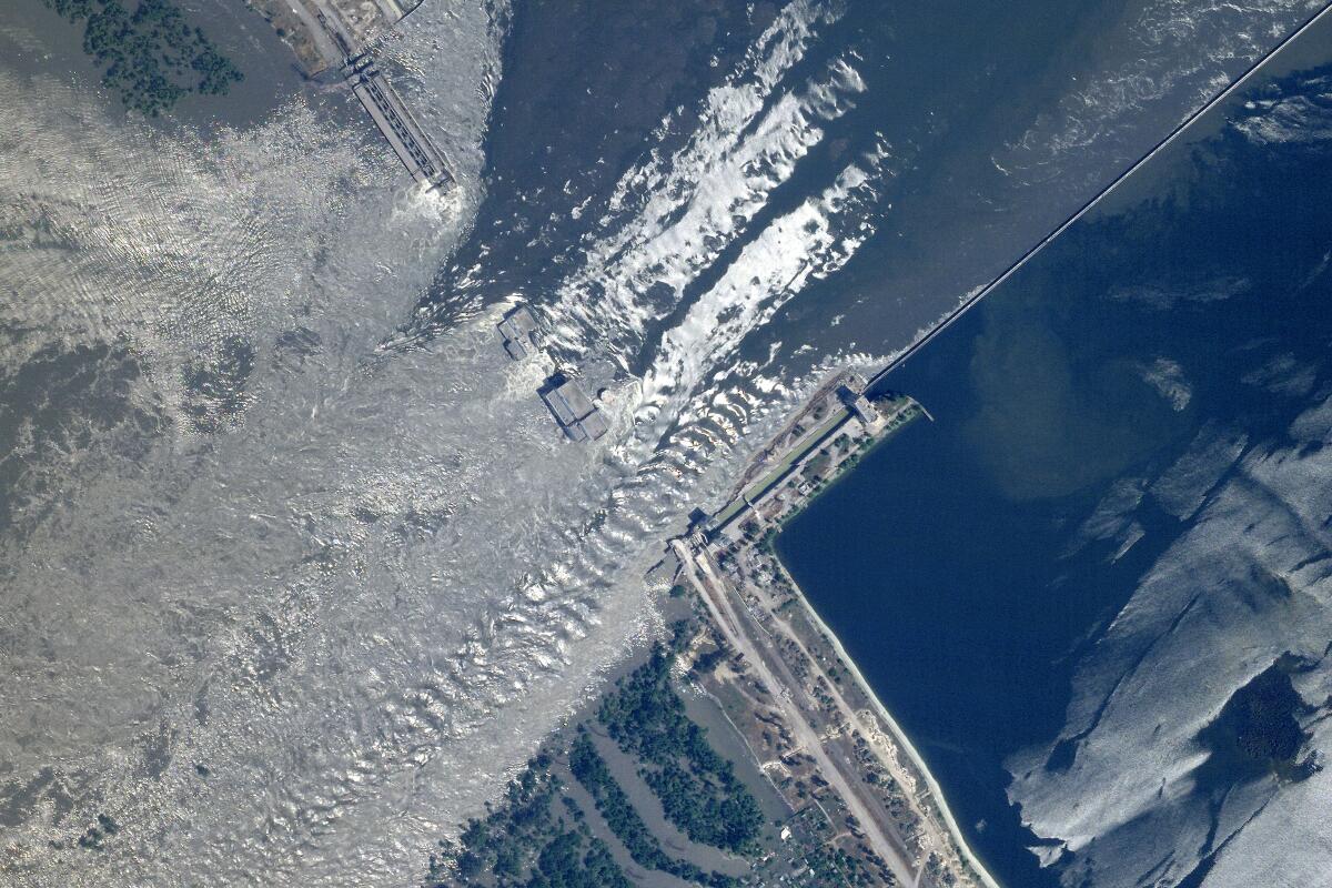 A satellite image shows damage to the Kakhovka dam in southern Ukraine.