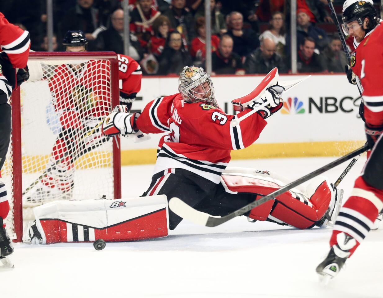 Scott Darling stops a puck during the second period.