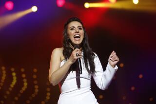 FILE - Ukraine's Eurovision winner singer Jamala performs during a concert, in Kyiv, Ukraine, Tuesday, May 24, 2016. Russia has placed a Ukrainian singer who won the 2016 Eurovision Song Contest on its wanted list, state news agencies reported Monday, Nov. 20, 2023. The reports said an Interior Ministry database listed singer Susana Jamaladinova as being sought for violating a criminal law. The independent news site Mediazona, which covers opposition and human rights issues, said Jamaladinova was charged under a law adopted last year that bans spreading so-called fake information about the Russian military and the ongoing fighting in Ukraine. (AP Photo/Sergei Chuzavkov, File )