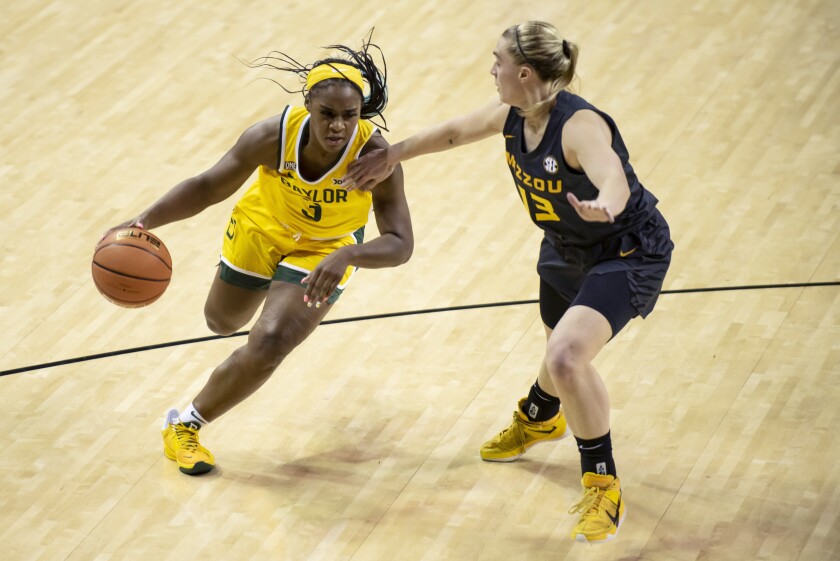 Baylor guard Jordan Lewis (3) drives past Missouri guard Haley Troup (13) in the first half of an NCAA college basketball game in Waco, Texas, Saturday, Dec. 4, 2021. (AP Photo/Emil Lippe)