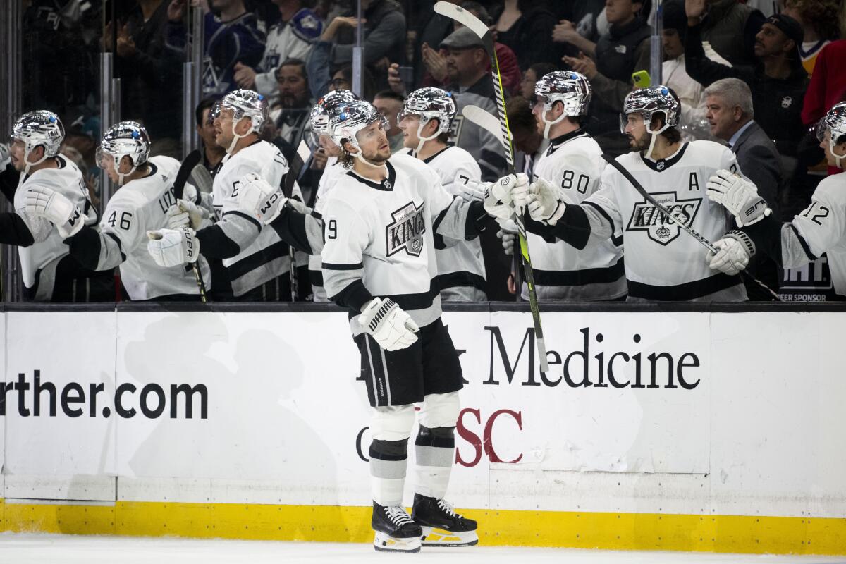 Kings right wing Adrian Kempe celebrates with teammates after scoring during the third period against the Sharks.