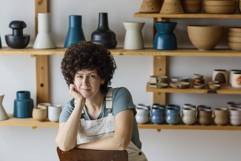 Pasadena, CA, Wednesday, August 9, 2023 - Potter Becki Chernoff of bX Ceramics at her studio surrounded by samples of her work. (Robert Gauthier/Los Angeles Times)