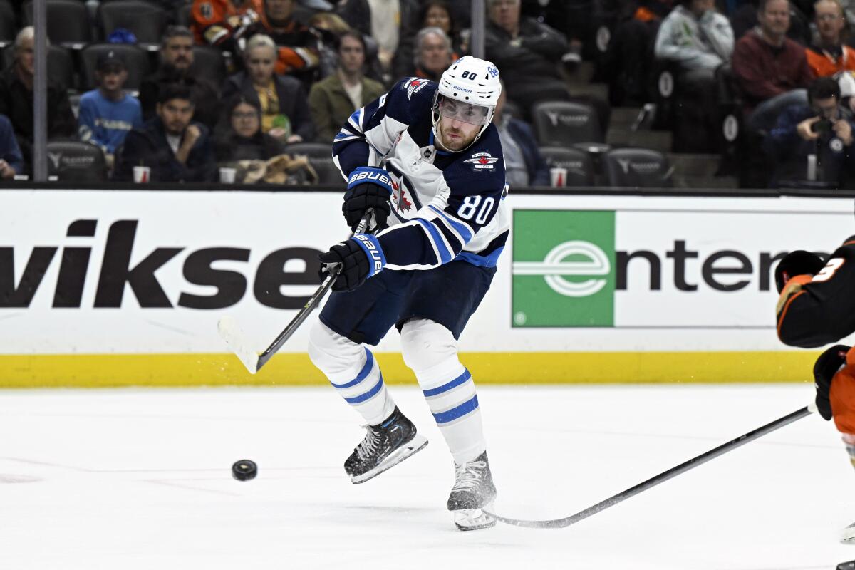 Winnipeg Jets left wing Pierre-Luc Dubois shoots against the Anaheim Ducks during the second period of an NHL hockey game in Anaheim, Calif., Thursday, March 23, 2023. (AP Photo/Alex Gallardo)