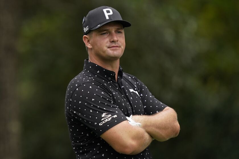 Bryson DeChambeau waits to tee off on the second hole during a practice round for the Masters golf tournament Tuesday, Nov. 10, 2020, in Augusta, Ga. (AP Photo/David J. Phillip)