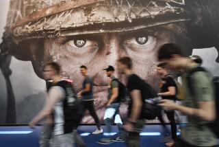 FILE - Visitors passing an advertisement for the video game 'Call of Duty' at the Gamescom fair for computer games in Cologne, Germany, Aug. 22, 2017. Microsoft has signed an agreement with Sony to keep the “Call of Duty” video game series on PlayStation following the tech giant’s acquisition of the video game maker Activision Blizzard. The announcement was made Sunday, July 16, 2023 in a Twitter post by Phil Spencer, who heads up Microsoft’s Xbox. (AP Photo/Martin Meissner, File)