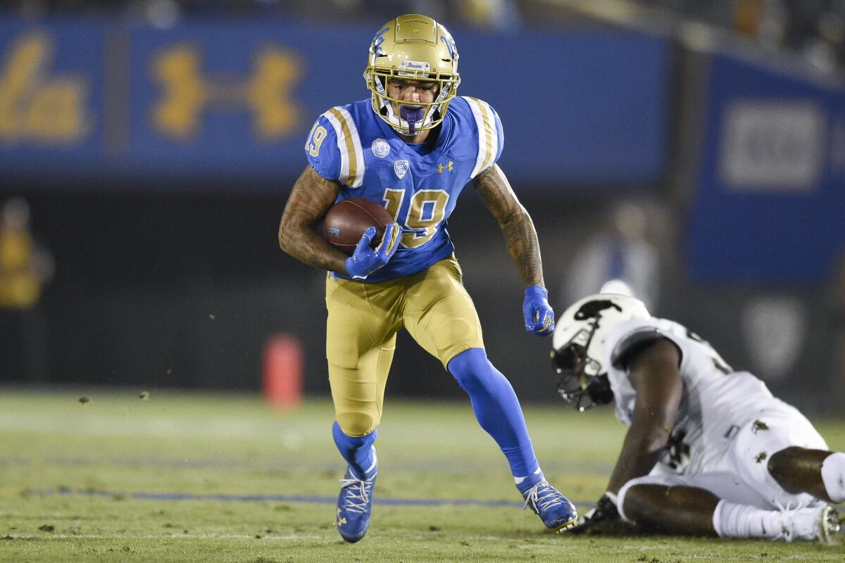 UCLA running back Kazmeir Allen carries the ball Saturday night against Colorado.