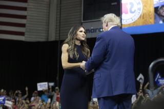 Former President Donald Trump greets South Dakota Gov. Kristi Noem at the South Dakota Republican Party Monumental Leaders rally Friday, Sept. 8, 2023, in Rapid City, S.D. (AP Photo/Toby Brusseau)