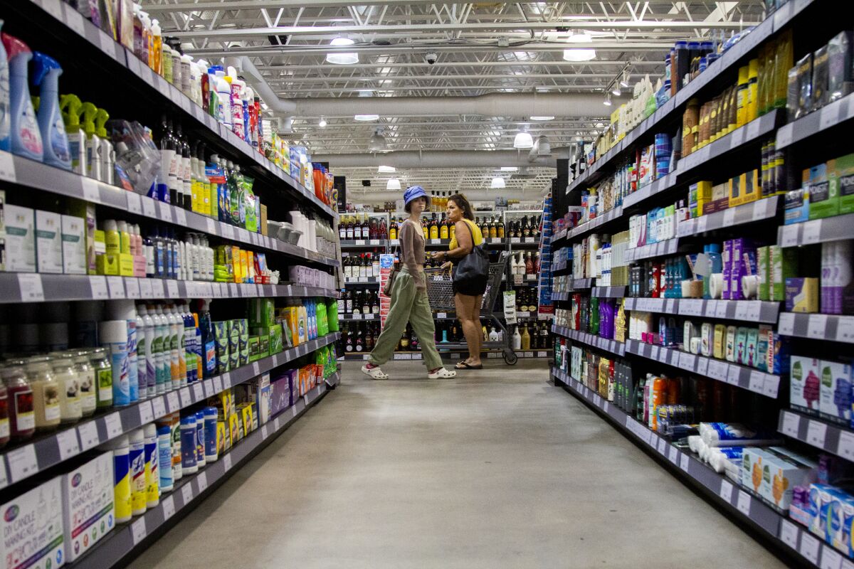 Customers browse aisles at the La Mesa BevMo, which has been converted into a local distribution hub for Gopuff.