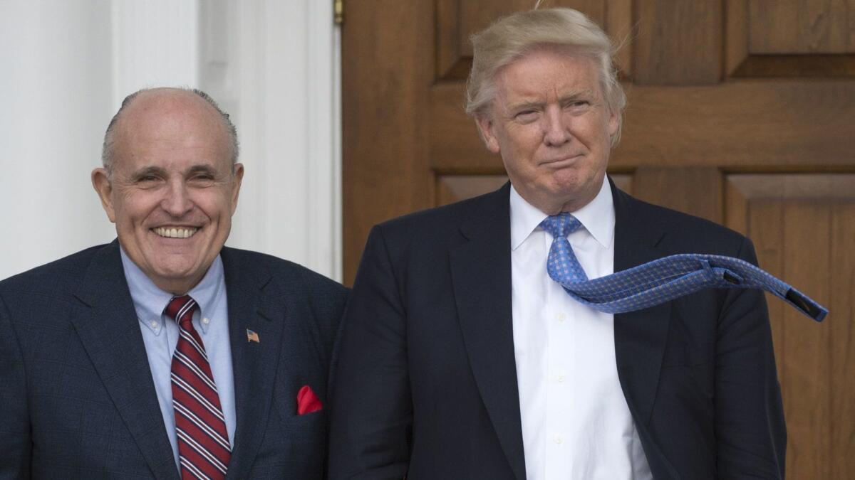 Then-President-elect Donald Trump and Rudy Giuliani appear in Bedminster, N.J., on Nov. 20, 2016.