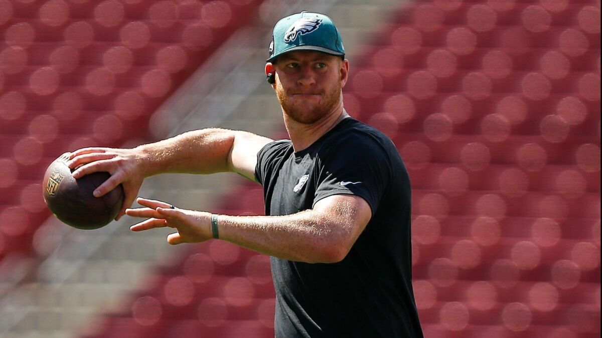 Carson Wentz throws before the Eagles game Sunday in Tampa Bay.