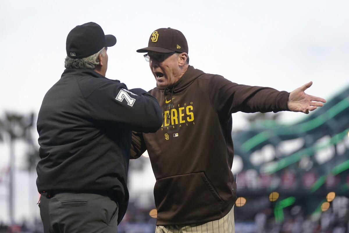 San Diego Padres manager Bob Melvin walks off the field during the