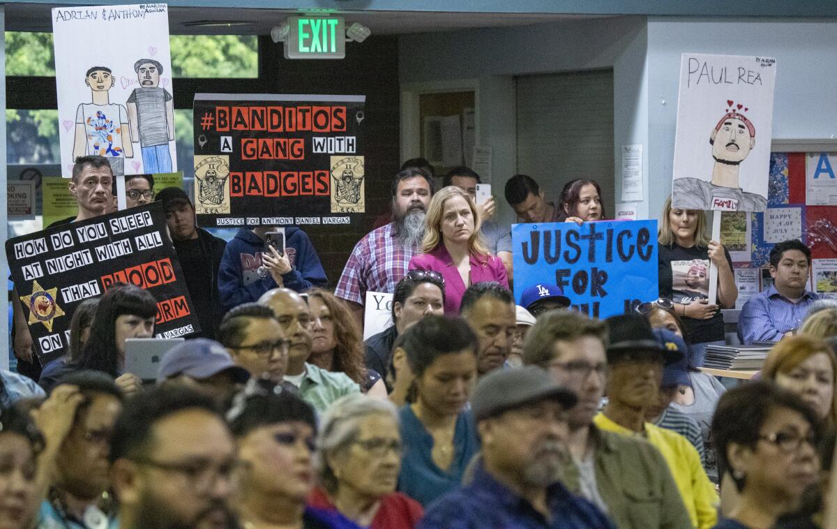 Residents attend a meeting of the L.A. County Civilian Oversight Commission
