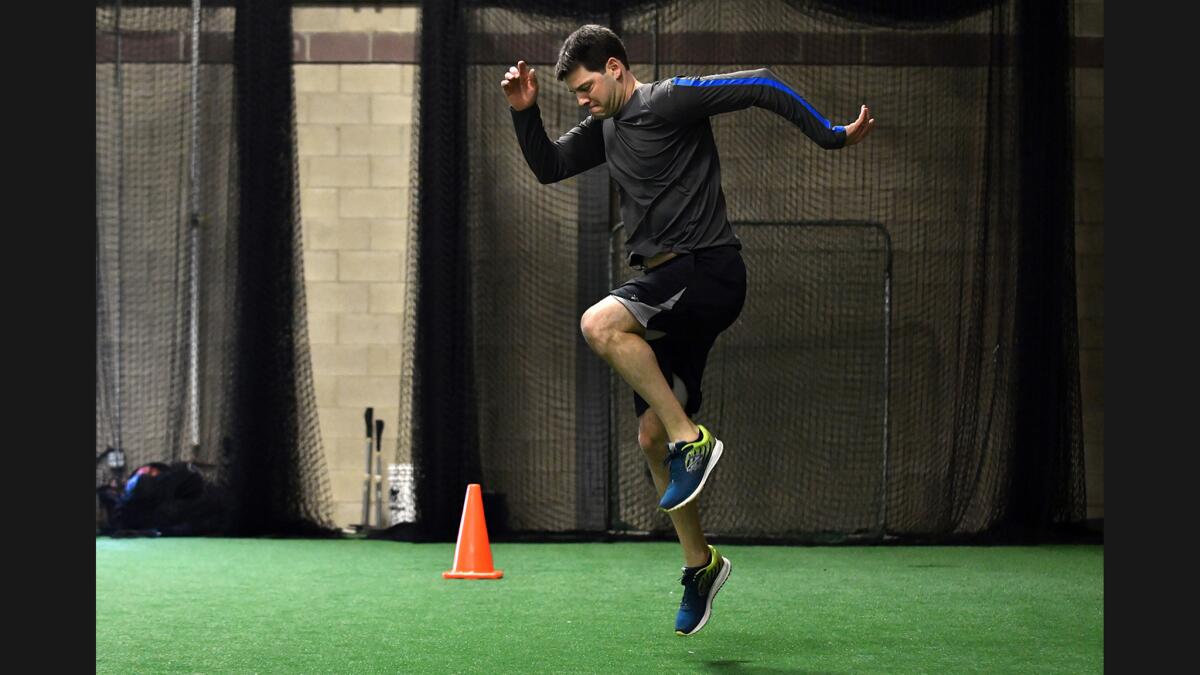 Dodgers pitcher Rich Hill works out at a facility in Woburn, Mass., on Jan. 18.