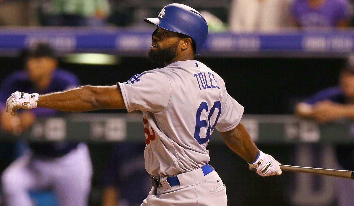 Andrew Toles hits a grand slam against Colorado on Aug. 31.
