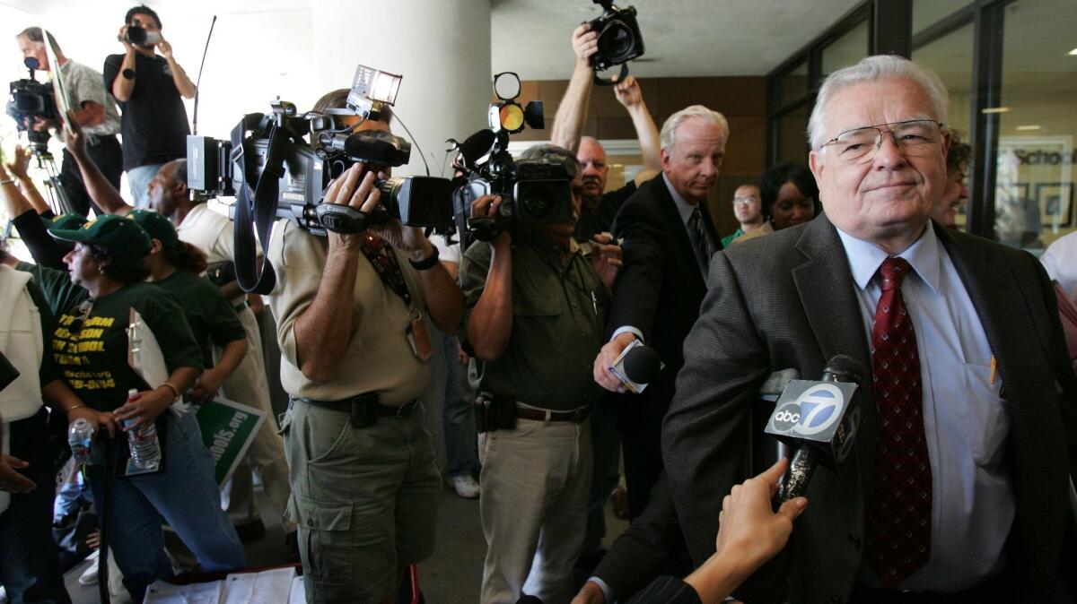Some skepticism greeted the selection of Roy Romer as L.A. schools chief. In this photo from 2005, Romer prepares to address protesters demanding better schools in low-income neighborhoods.