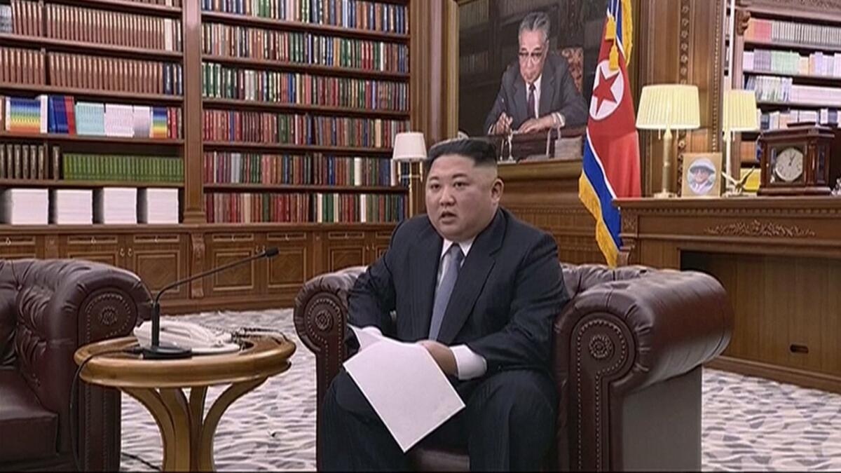 North Korean leader Kim Jong Un delivers a speech in a photo distributed on Jan. 1.