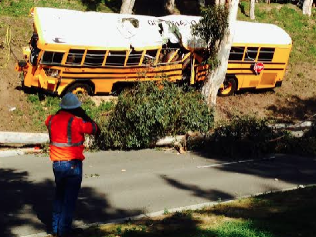 A school bus with 11 students and a driver crashed in the Anaheim Hills, leaving six people injured, officials say.