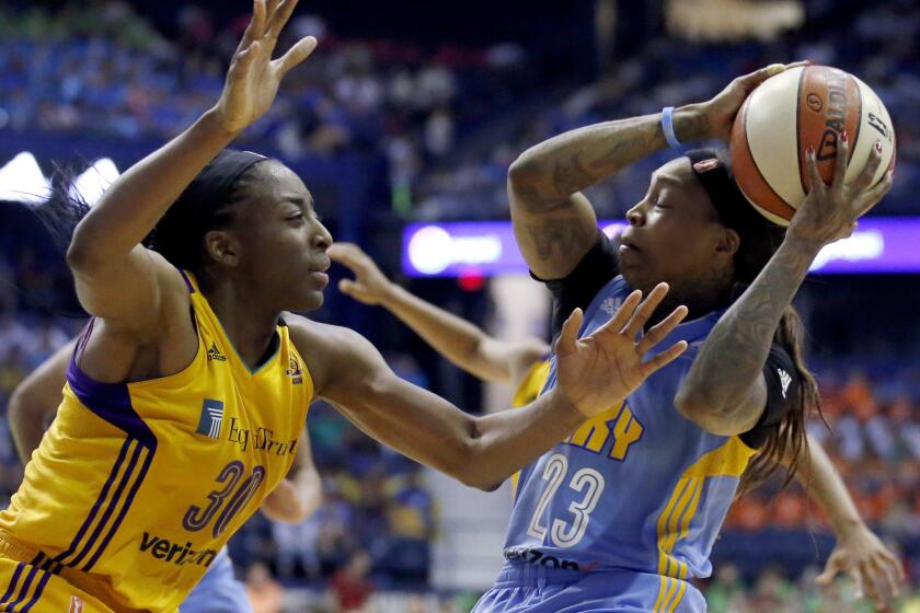 Sparks forward Nneka Ogwumike, left, guards Chicago Sky guard Cappie Pondexter in July. The two teams will begin a best-of-five playoff Wednesday at the Pyramid at Long Beach State.
