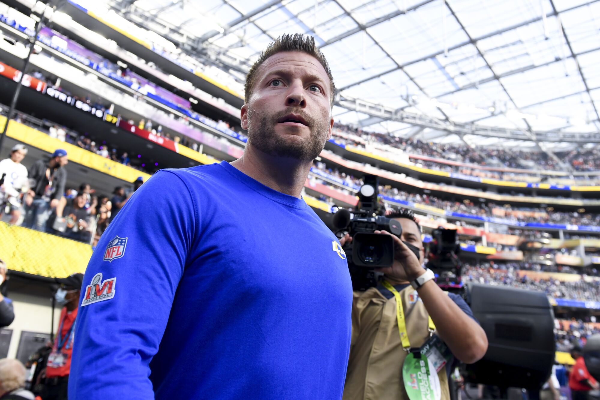 Rams coach Sean McVay makes his way onto the field before Super Bowl LVI.