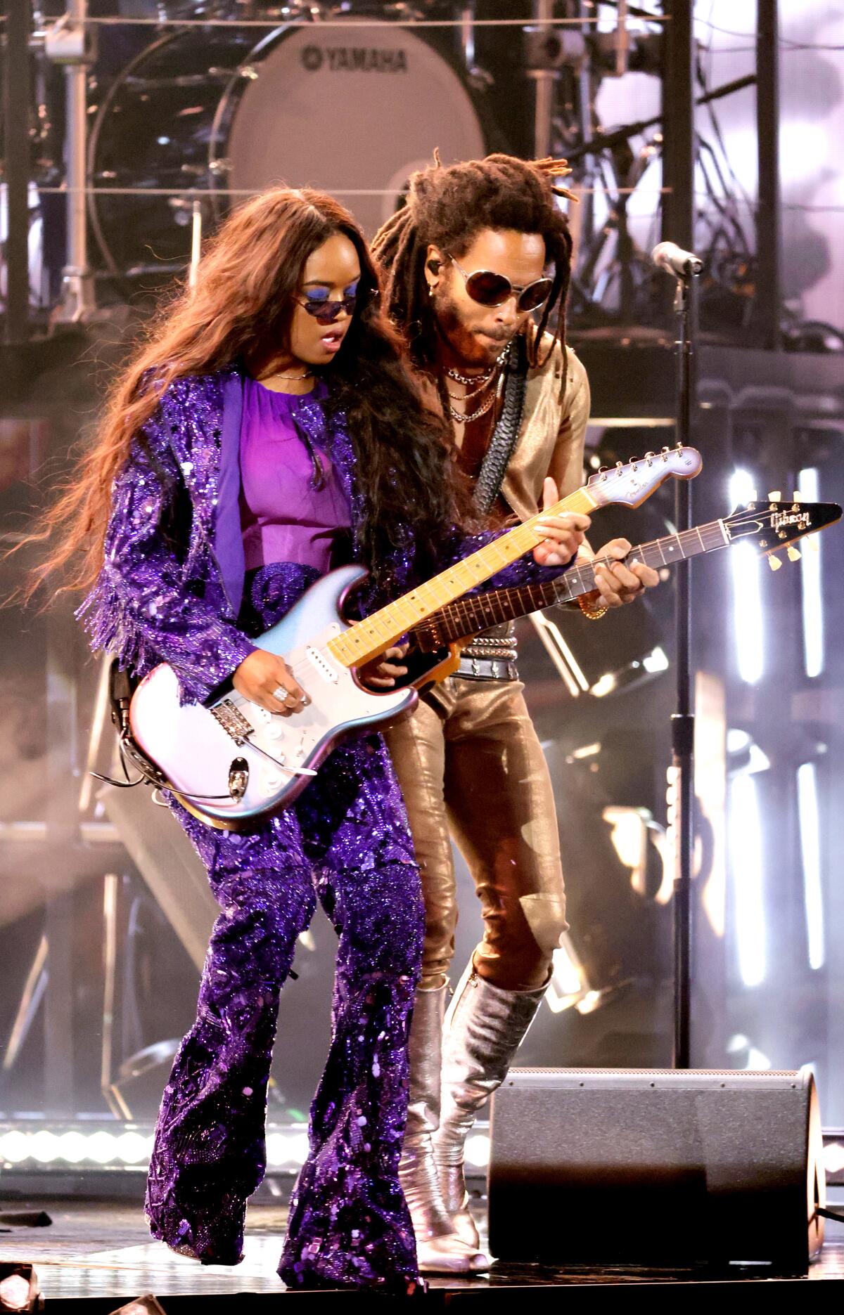  H.E.R. and Lenny Kravitz perform onstage during the 64th Annual GRAMMY Awards.