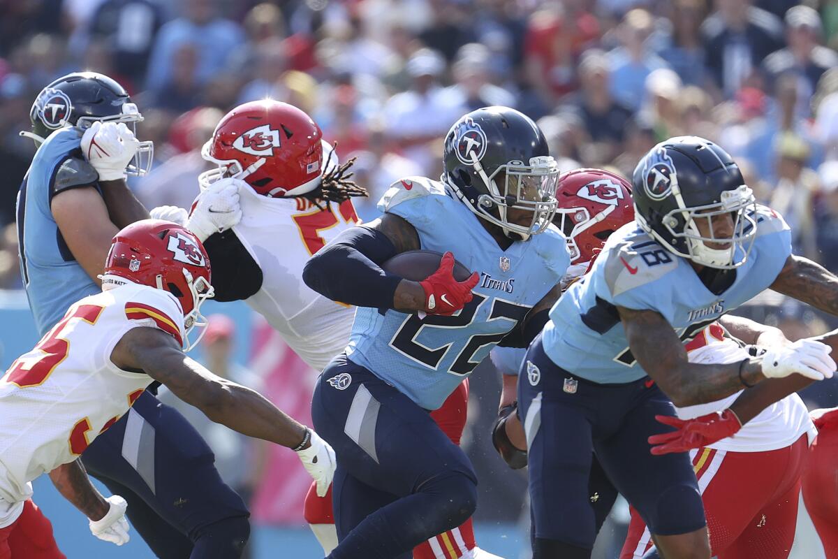 Derrick Henry (22) of the Tennessee Titans runs with the ball in the second quarter against the Kansas City Chiefs.