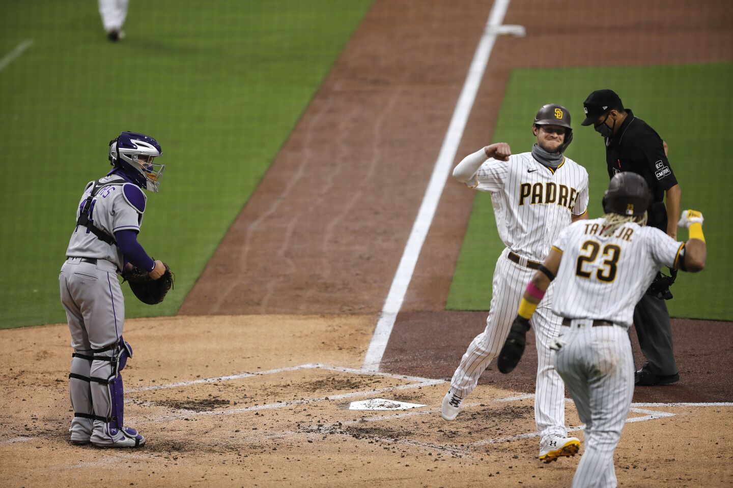 San Diego Padres Wil Myers celebrates with Fernando Tatis Jr. after hitting a grand slam in the 1st inning against the Colorado Rockies on Tuesday, Sept. 8, 2020.