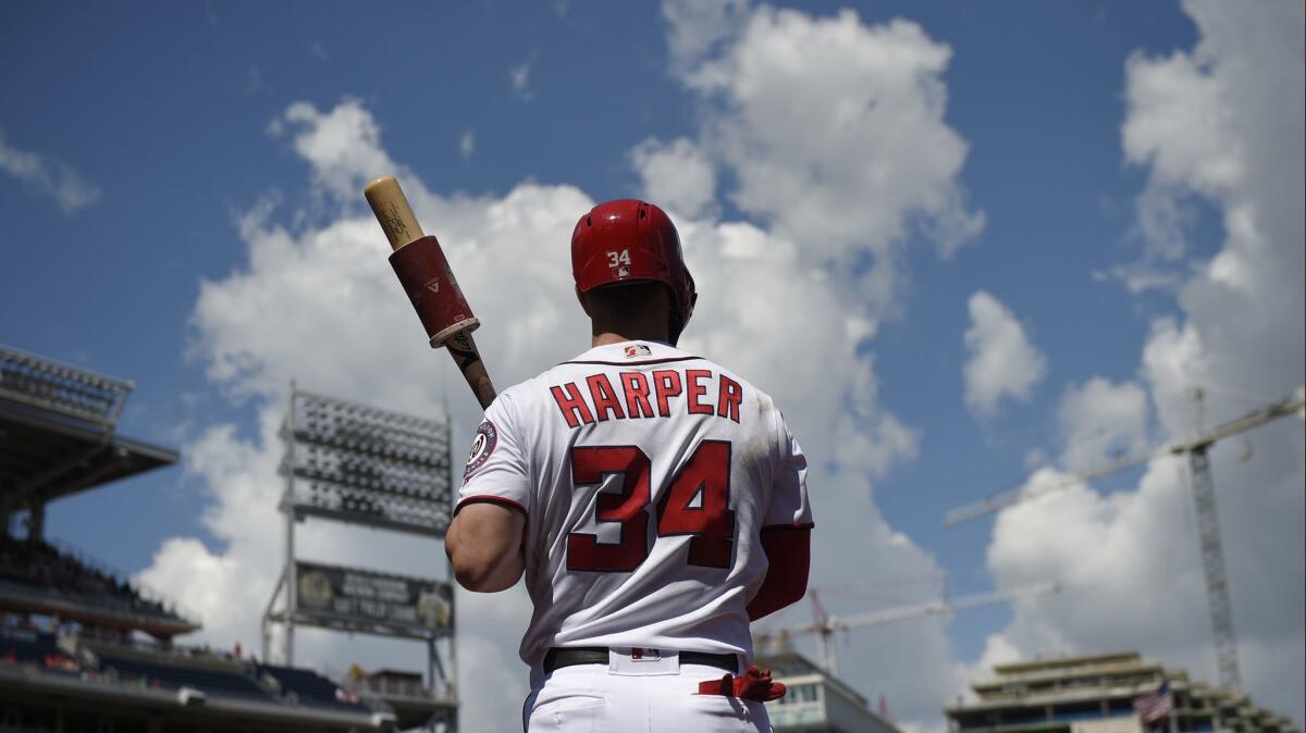 Bryce Harper stands on the on deck circle during the first inning of a game between the Washington Nationals and St. Louis Cardinals on Sept. 3.