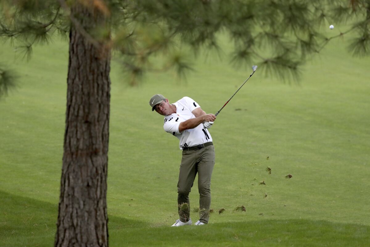 Paul Casey hits out of the 7th fairway during the first round of the Masters golf tournament Thursday, Nov. 12, 2020, in Augusta, Ga. (Curtis Compton/Atlanta Journal-Constitution via AP)