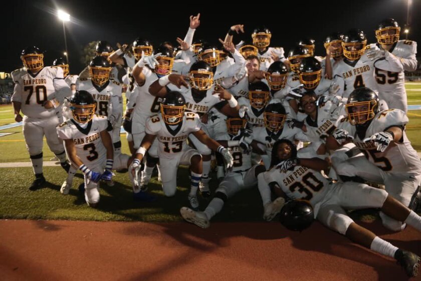 San Pedro football players celebrate after completing a 9-1 season in 2019.