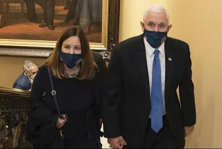 FILE - In this image from video released by the House Select Committee, Vice President Mike Pence and his wife Karen walk at the Capitol on Jan 6, that the House select committee investigating the Jan. 6 attack on the U.S. Capitol displayed June 16, 2022, on Capitol Hill in Washington. The subpoena to former Vice President Mike Pence is a milestone moment in an ongoing Justice Department special counsel investigation. But it doesn't guarantee he's going to be testifying before a grand jury anytime soon. (House Select Committee via AP, File)
