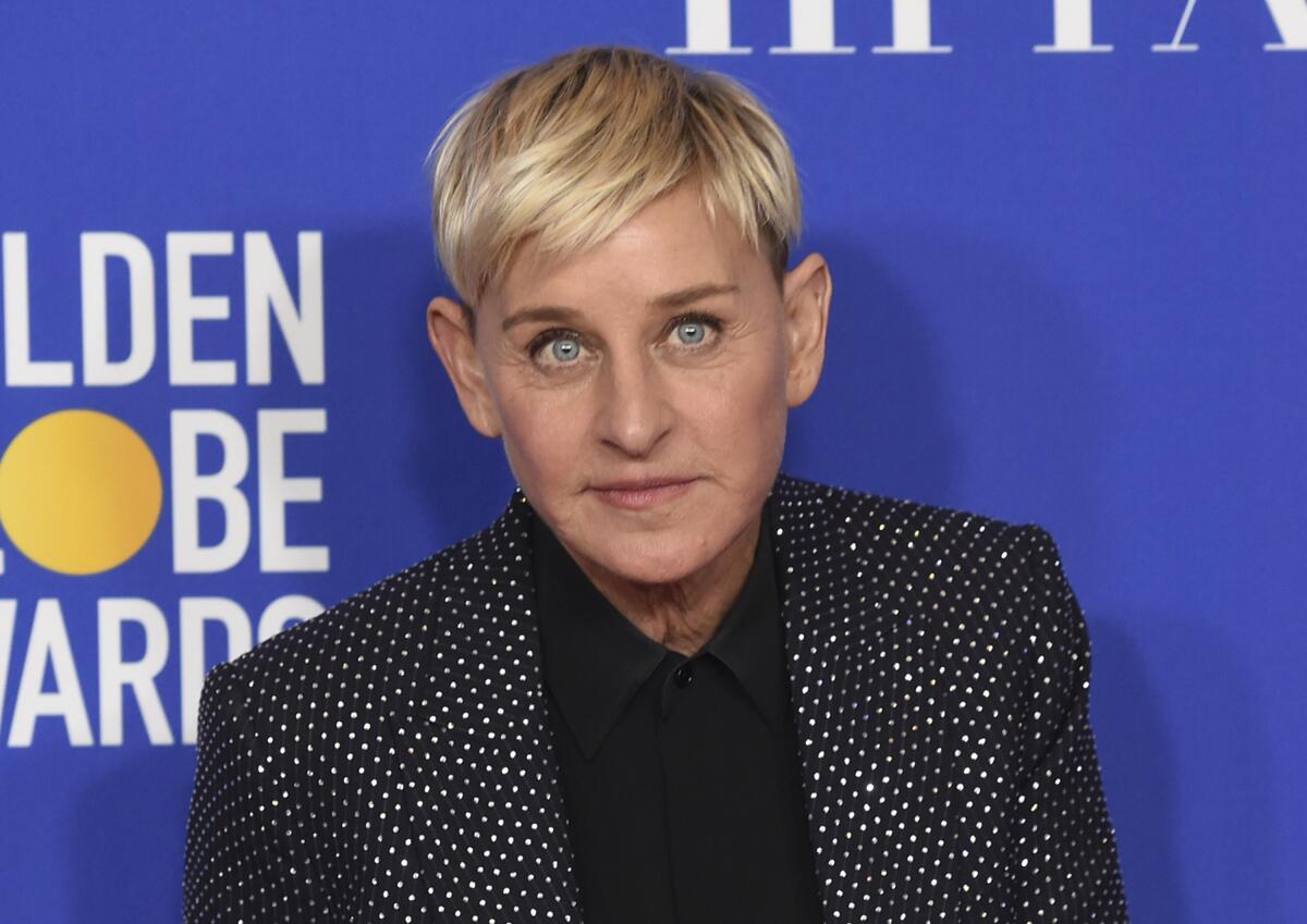 Ellen DeGeneres in a sparkly black jacket.