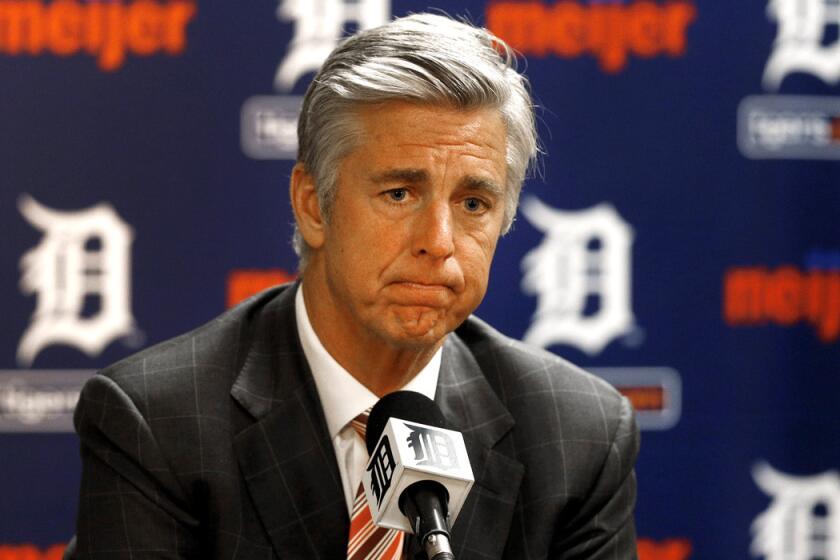 Former Detroit Tigers general manager Dave Dombrowski speaks to the media during a baseball news conference in Detroit on October 14, 2014.